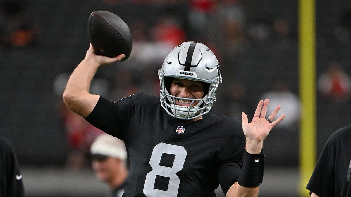 Kirk Cousins warms up before a preseason game in Las Vegas.