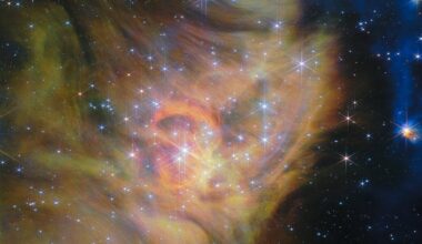 A swirling landscape of dust and dwarf stars in one of the largest JWST photos ever released
