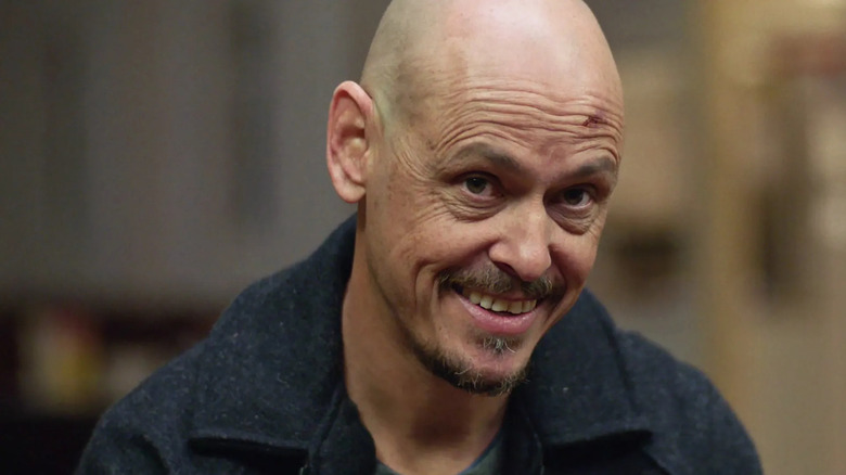 Ray (Scott Ryan) smiling on 