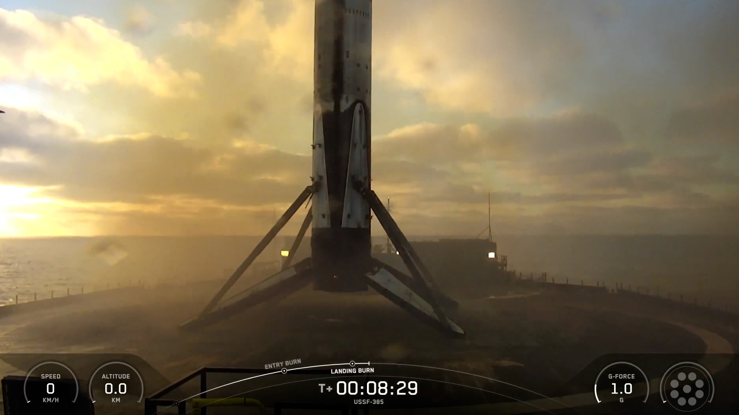 The first stage of a SpaceX Falcon 9 rocket rests on the deck of a drone ship shortly after launching the USSF-385 mission for the U.S. Space Force on Sept. 26, 2026.