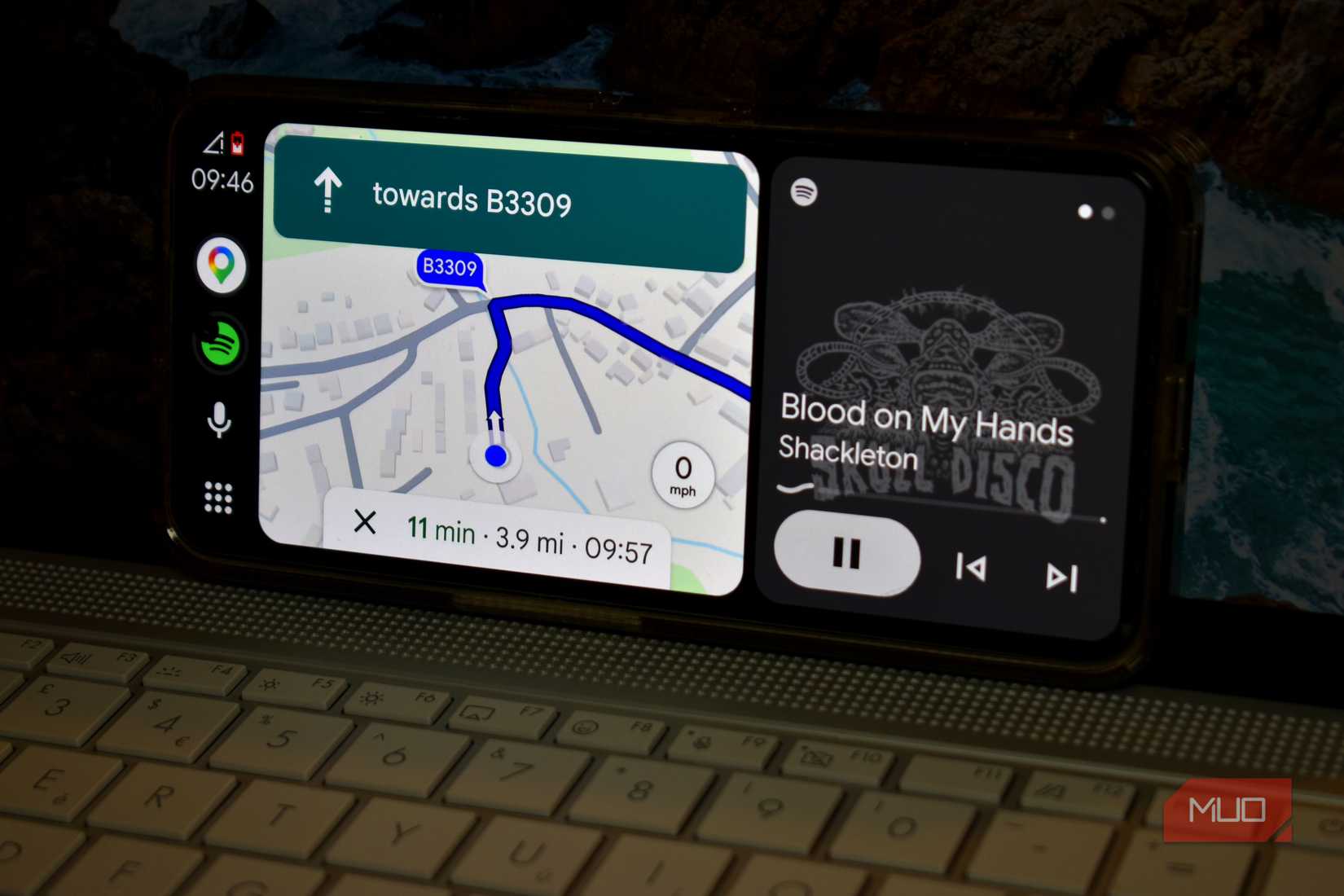 open headunit android auto app with spotify on smartphone screen.