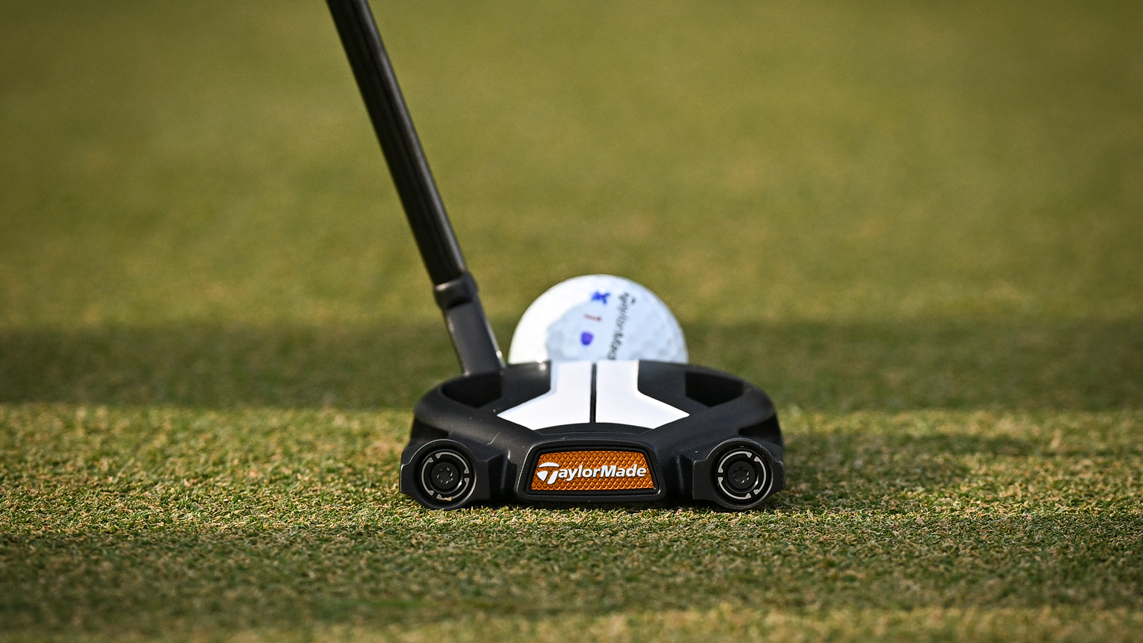 A close-up of a TaylorMade Spider putter