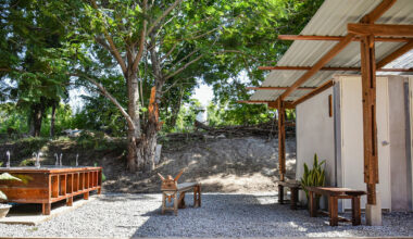 volunteers in thailand build school toilet from reclaimed wood