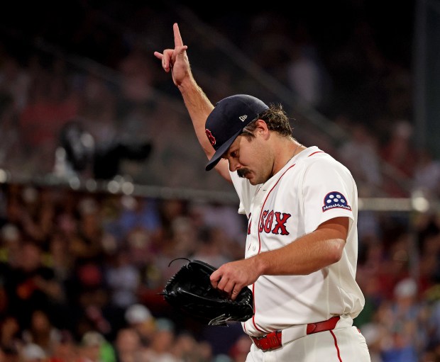 Boston, MA - August 31 - Boston Red Sox pitcher Payton Tolle (70) acknowledges the cheering crowd after being taken out in the sixth inning at Fenway Park. (Photo By Matt Stone/Boston Herald).