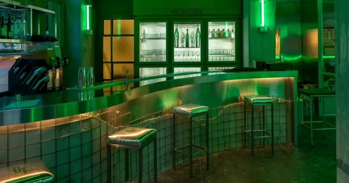 studiomateriality translates lucha libre into green-lit, stainless-steel bar