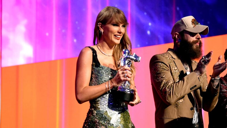 Taylor Swift on stage with a VMA