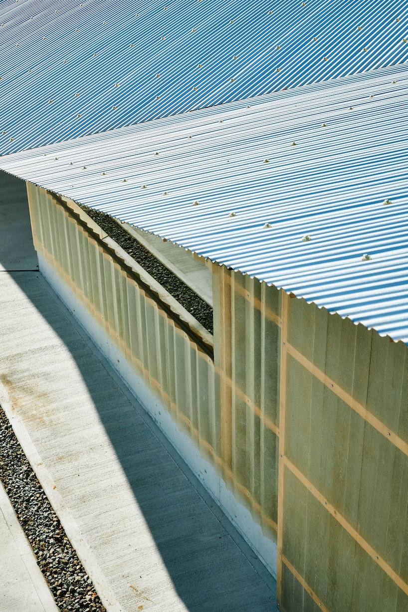 triangular timber structure encloses tsukumo kiln ceramic studio in kobe, japan - 2