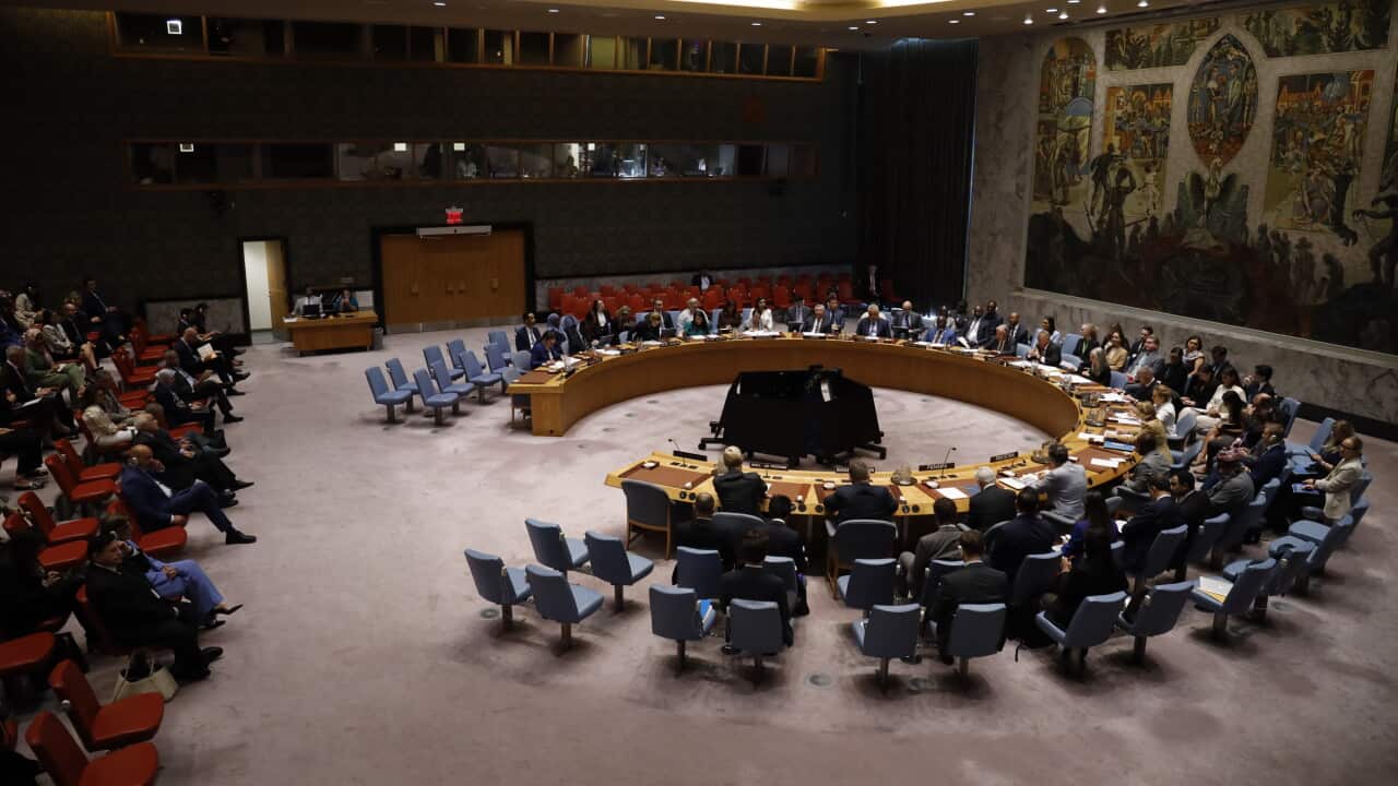 Delegates seated around the horseshoe table in the UN Security Council chamber in New York.
