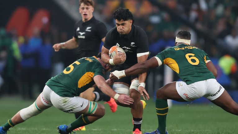 Wallace Sititi carries the ball for the All Blacks against the Springboks in Soweto.