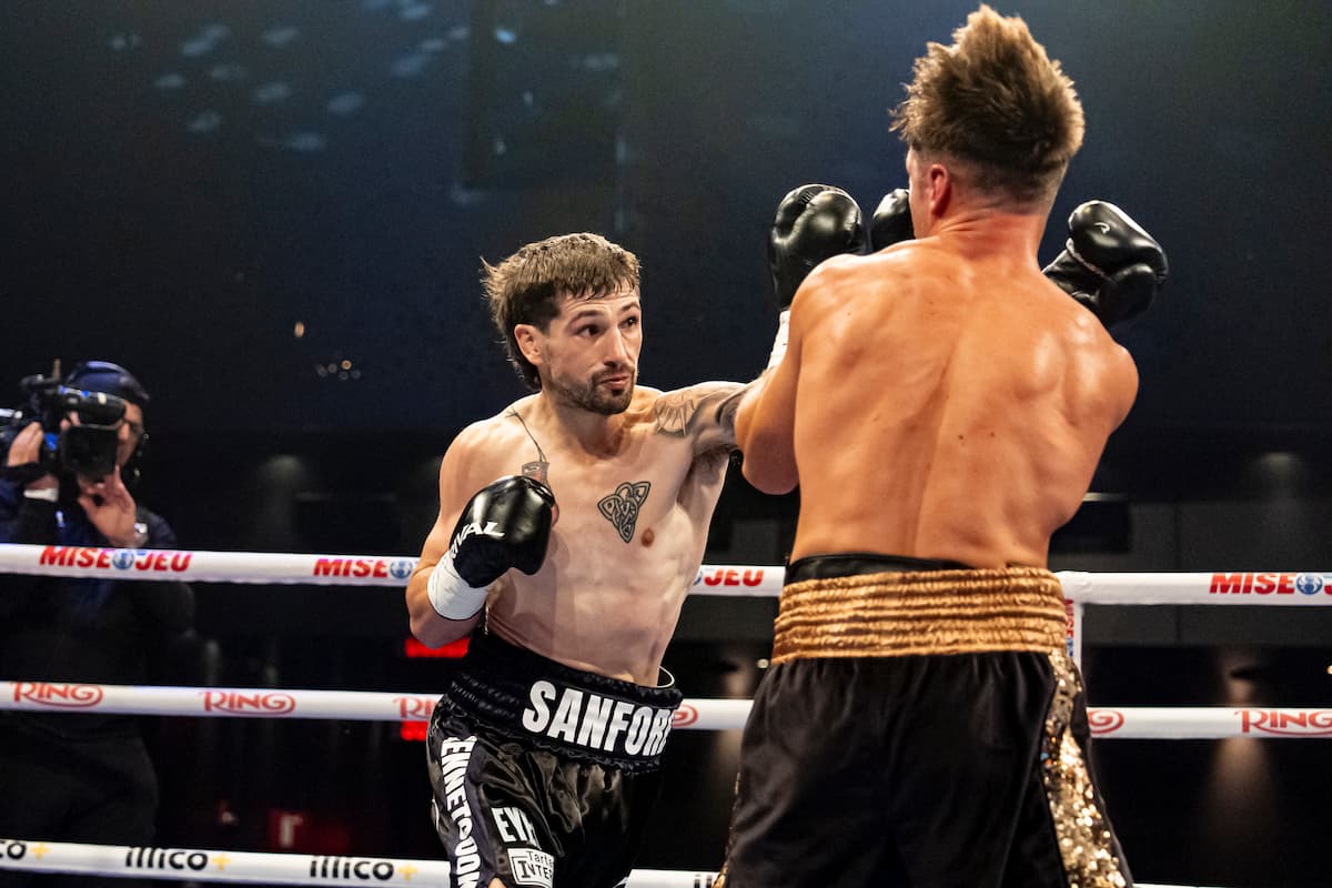 Wyatt Sanford lands a punch during his bout against Costin Ion