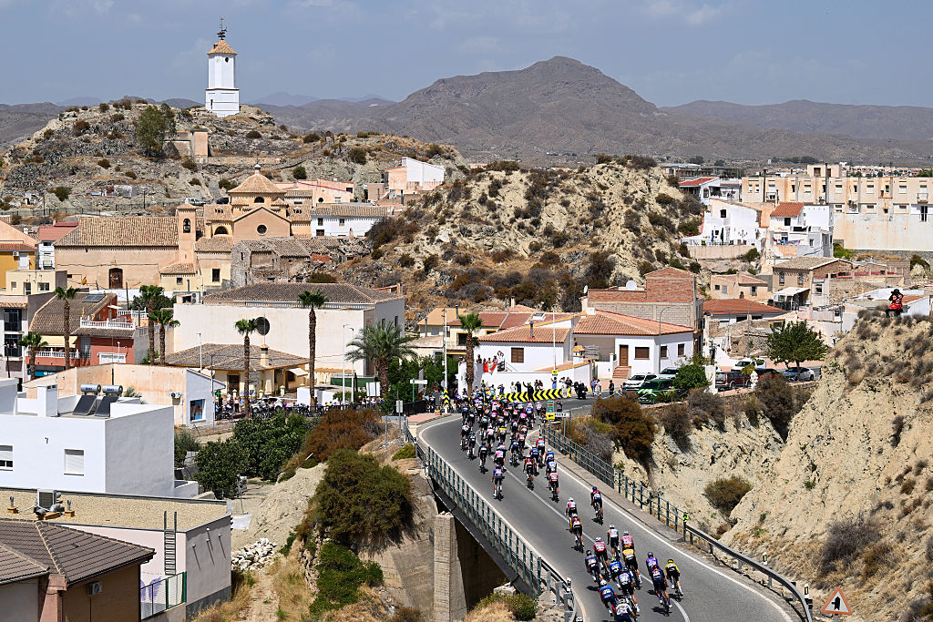 CALAR ALTO, SPAIN - SEPTEMBER 03: A general view of the peloton passing through a Arboleas village during the La Vuelta - 81st Tour of Spain 2026, Stage 12 a 166.6km stage from Vera to Calar Alto 2151m / #UCIWT / on September 03, 2026 in Calar Alto, Spain. (Photo by Tim de Waele/Getty Images)