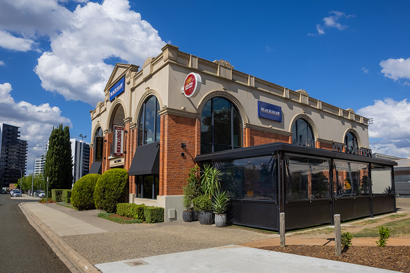 Exterior of a large pub.
