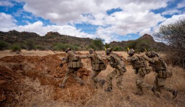 British soldier regiment 'Lions of England' stalked by pack of hyenas in Kenya