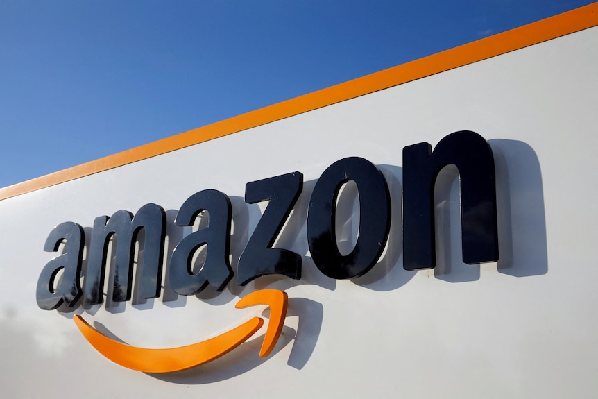 An Amazon logo on the side of a building.