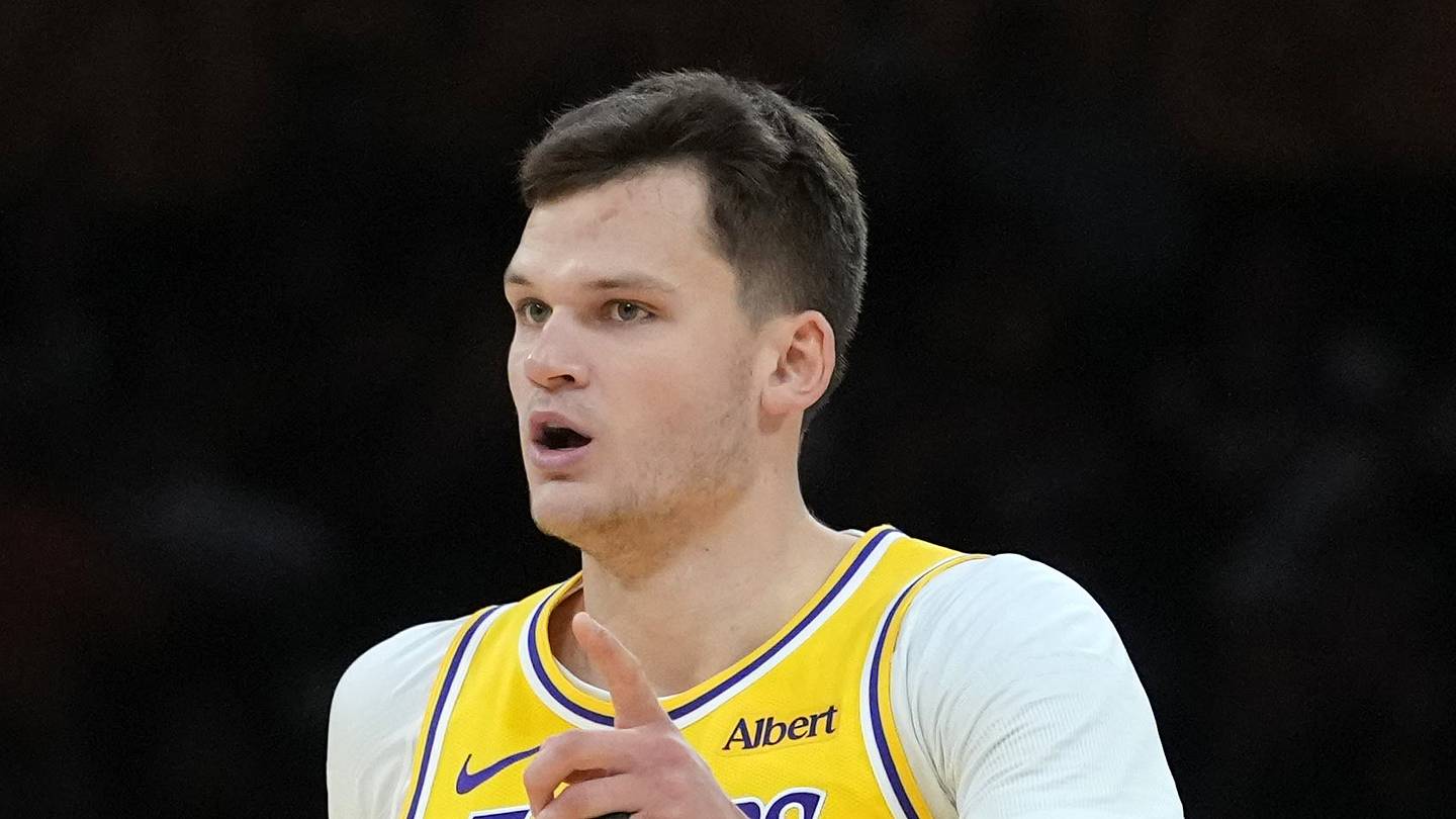 Oct 21, 2026; Los Angeles, California, USA; Los Angeles Lakers center Walker Kessler (14) reacts against the Golden State Warriors in the first half at Crypto.com Arena. Mandatory Credit: Kirby Lee-Imagn Images