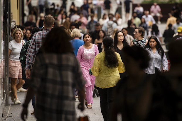 A photo of shoppers in the Queen St Mall. Population, economy, demographics, people, Australia, generic