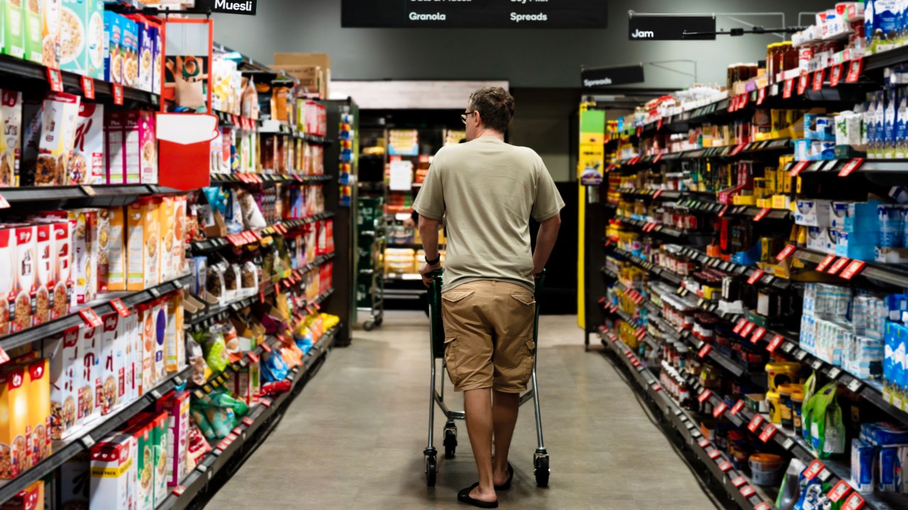 New ABS figures show Aussies are filling their trolleys, and stomachs, with junk food such as sausages, biscuits and chocolate