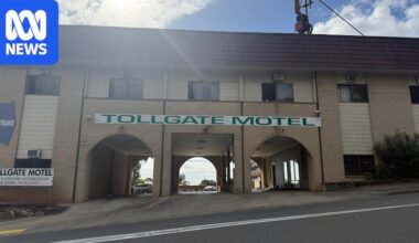 Multiple police vehicles attend Tollgate Motel to investigate unexplained infant death