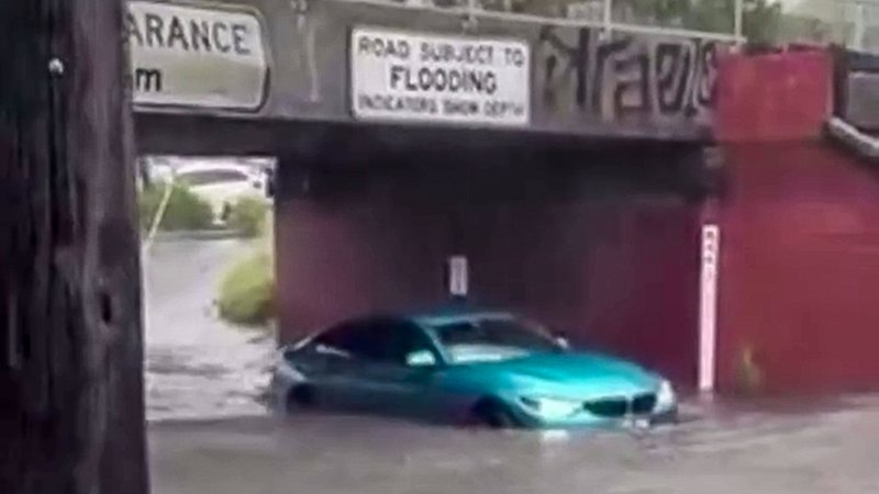 Melbourne flash flooding: Family rescued from submerged cars as heavy rain hits Victoria