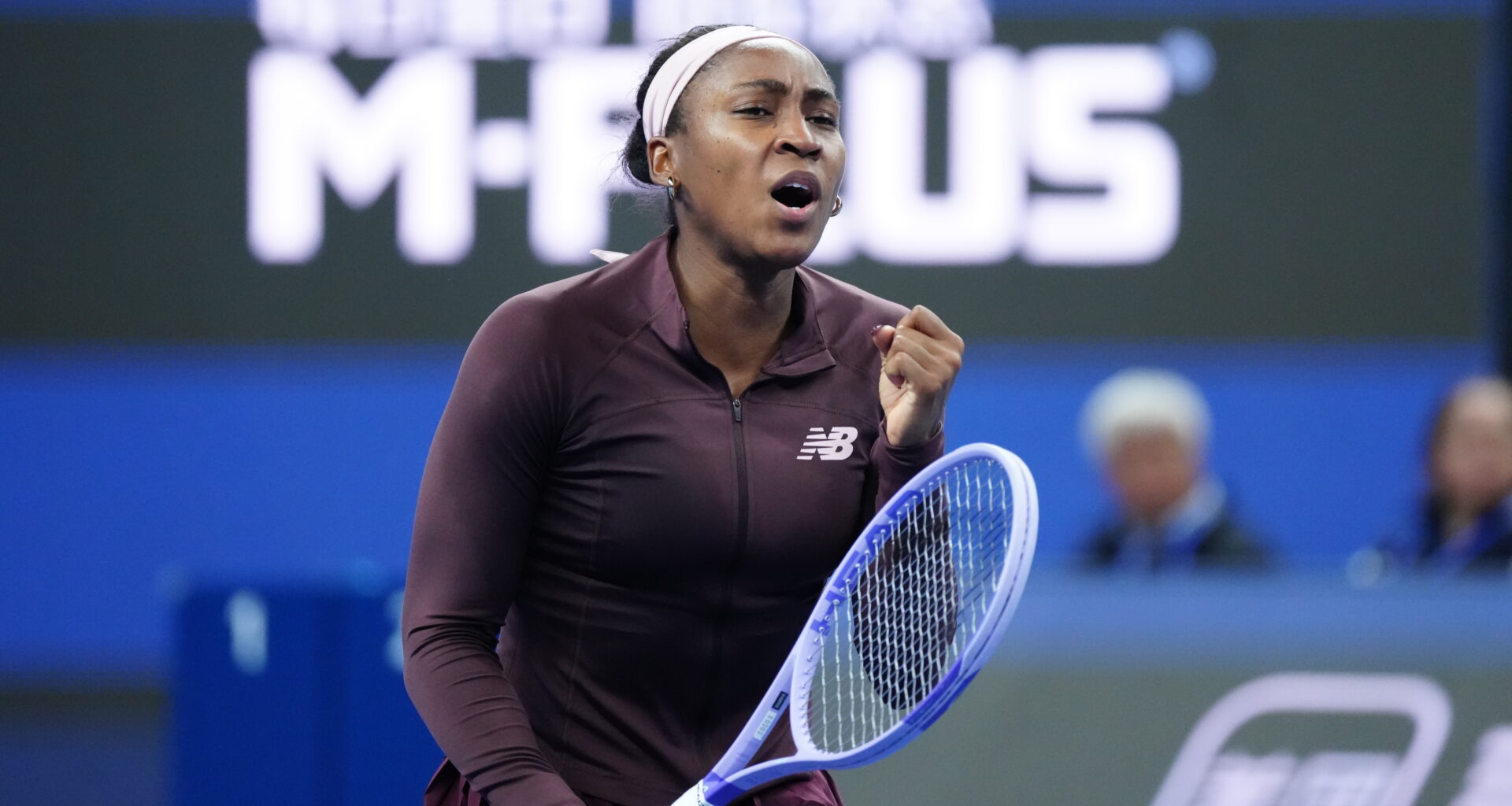 Gauff pulls away late to defeat rising Sun in Beijing