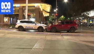 Pedestrian, police car struck after Sydney CBD carjacking