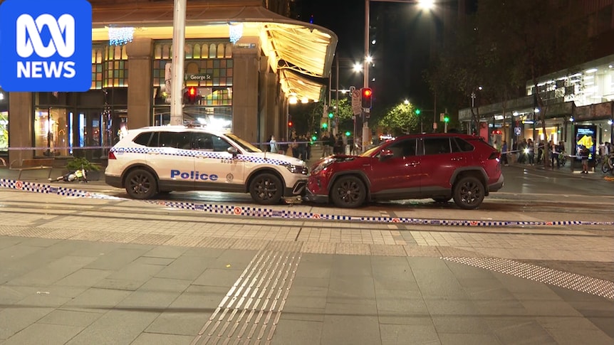 Pedestrian, police car struck after Sydney CBD carjacking