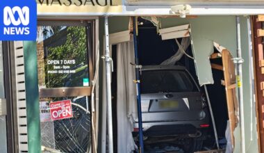 Five people injured after car driven into shopfront in Canberra's south