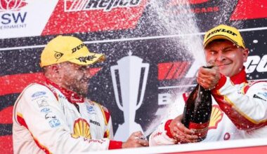 Brodie Kostecki (l) and Todd Hazelwood (c) celebrate their Bathurst 1000 triumph. Photo: Mark Evans/AAP PHOTOS