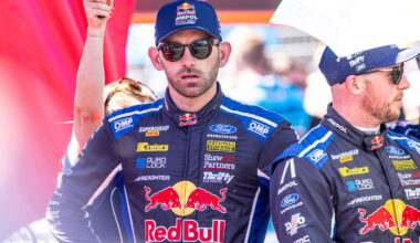 Broc Feeney and a teammate in Red Bull Ampol racing suits in the pit lane.
