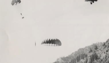 Beavers in wooden boxes parachute from a plane into the Chamberlain Basin in 1948. Photograph courtesy of Idaho Fish and Game