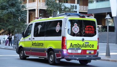 Queensland health system pressure: Investigation launched after patient dies following ambulance delay in Brisbane