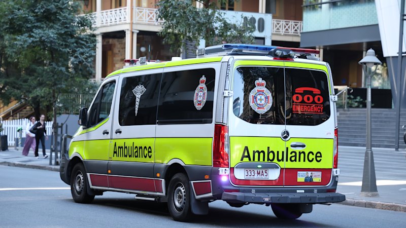 Queensland health system pressure: Investigation launched after patient dies following ambulance delay in Brisbane