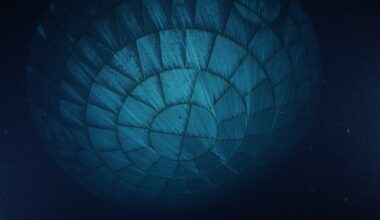 The Orion spacecraft's heat shield dominates this underwater photo. Due to the water, the heat shield appears to be teal-colored.