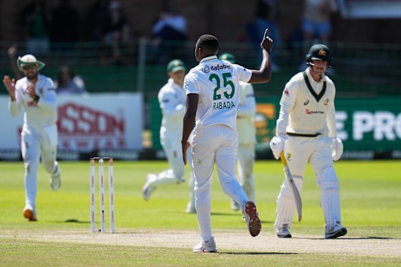 South Africa’s Kagiso Rabada, centre, celebrates the wicket of Australia’s Nic Maddinson, right, on day four.
