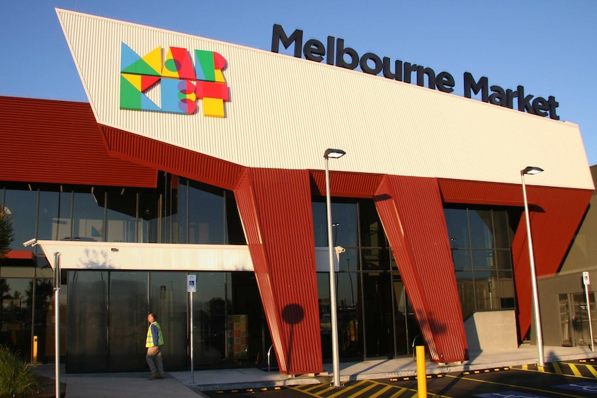 A worker walks past the administration building at new Melbourne wholesale produce market