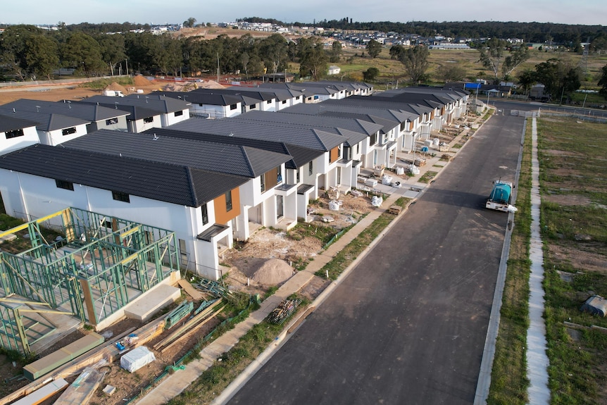 Aerial view of a housing estate with houses under construction