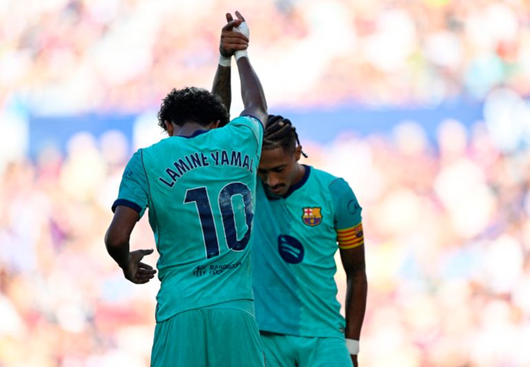 Soccer Football - LaLiga - Levante v FC Barcelona - Estadi Ciutat de Valencia , Valencia, Spain - September 13, 2026 FC Barcelona's Lamine Yamal celebrates scoring their third goal with Raphinha REUTERS/Pablo Morano