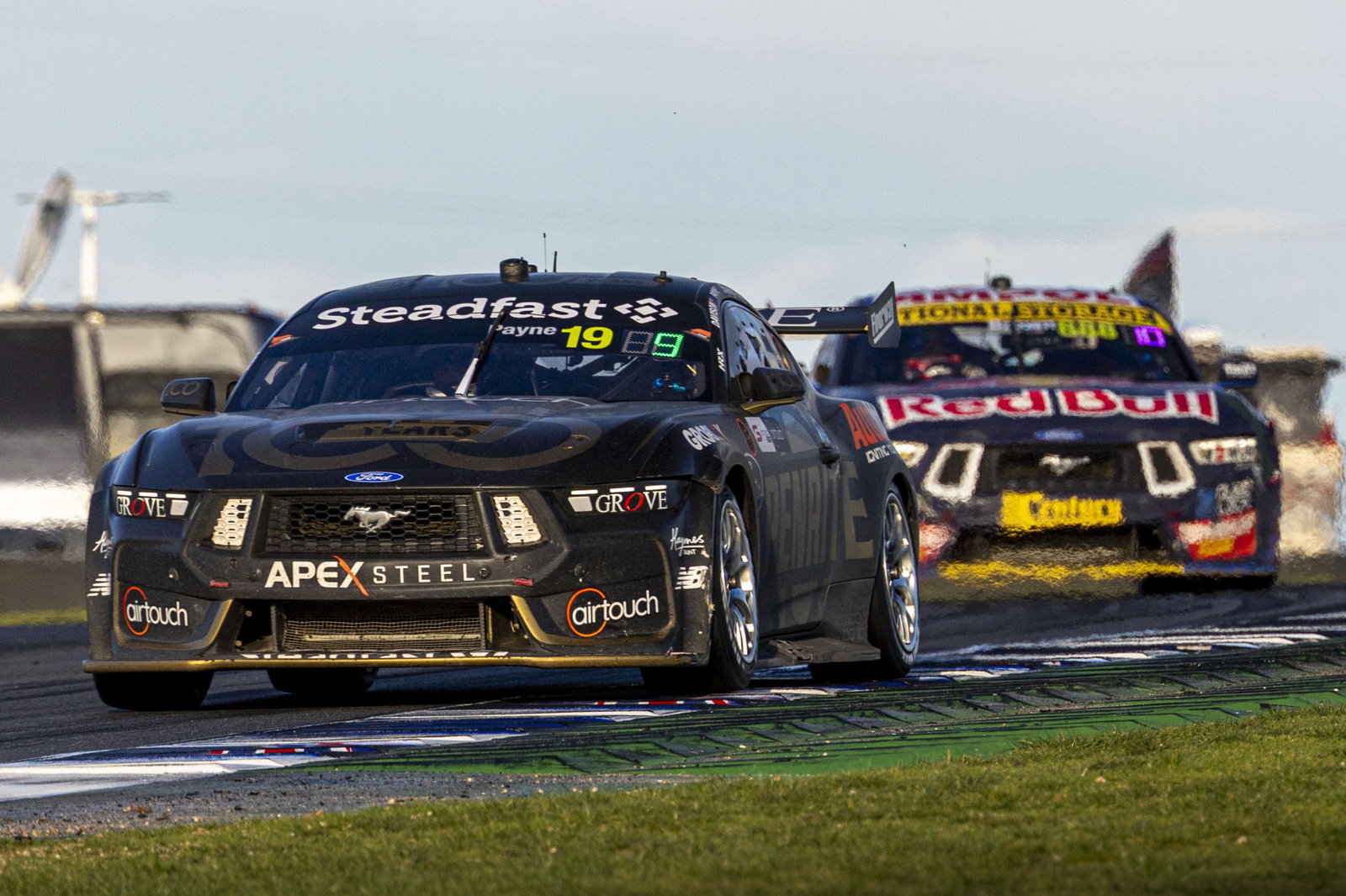 Grove Racing's Matt Payne leads Will Brown at The Bend.