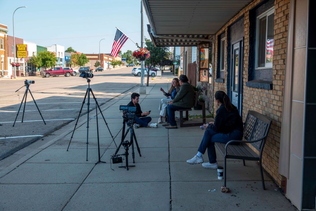The CNN crew spent 30 days in Hettinger to document rural health care shortages. Here CNN correspondent Ed Lavandera interviews the CEO of West River Health Services, Alyson Kornele, on Main Street.