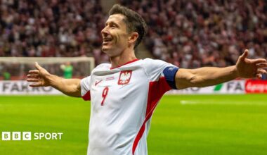 Poland striker Robert Lewandowski celebrates completing his hat-trick against Romania in the Nations League