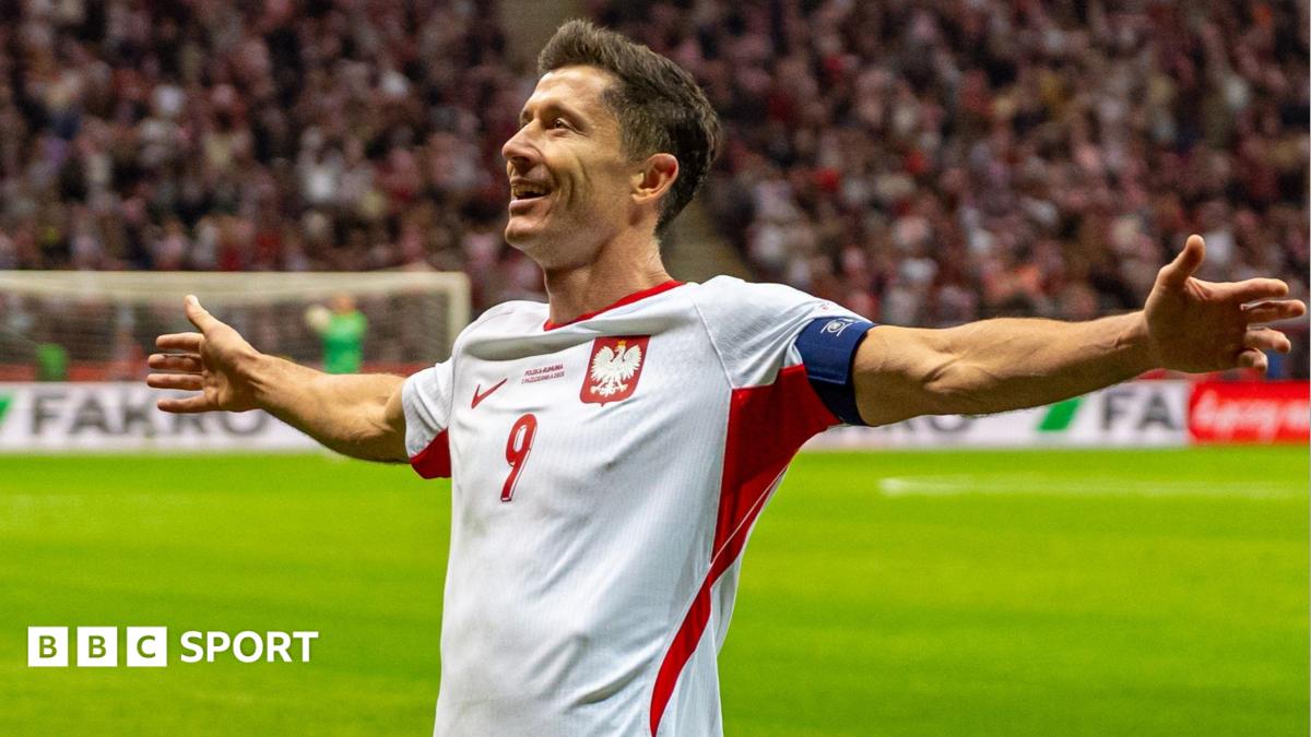 Poland striker Robert Lewandowski celebrates completing his hat-trick against Romania in the Nations League