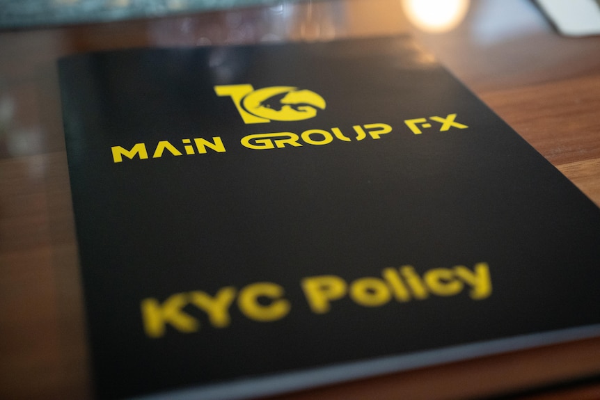 A booklet on a table with the words 'Know Your Customer' on the front
