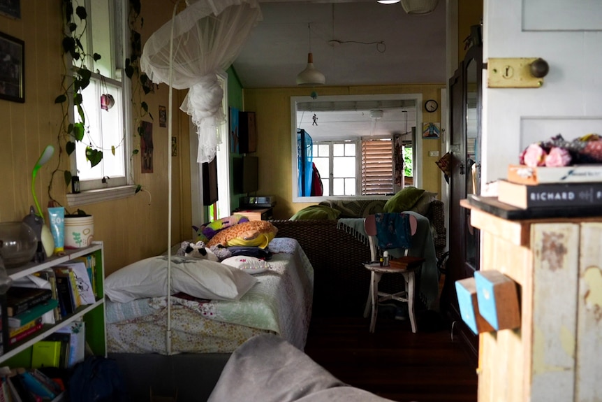 The inside of a home showing large openings where breezes can pass.