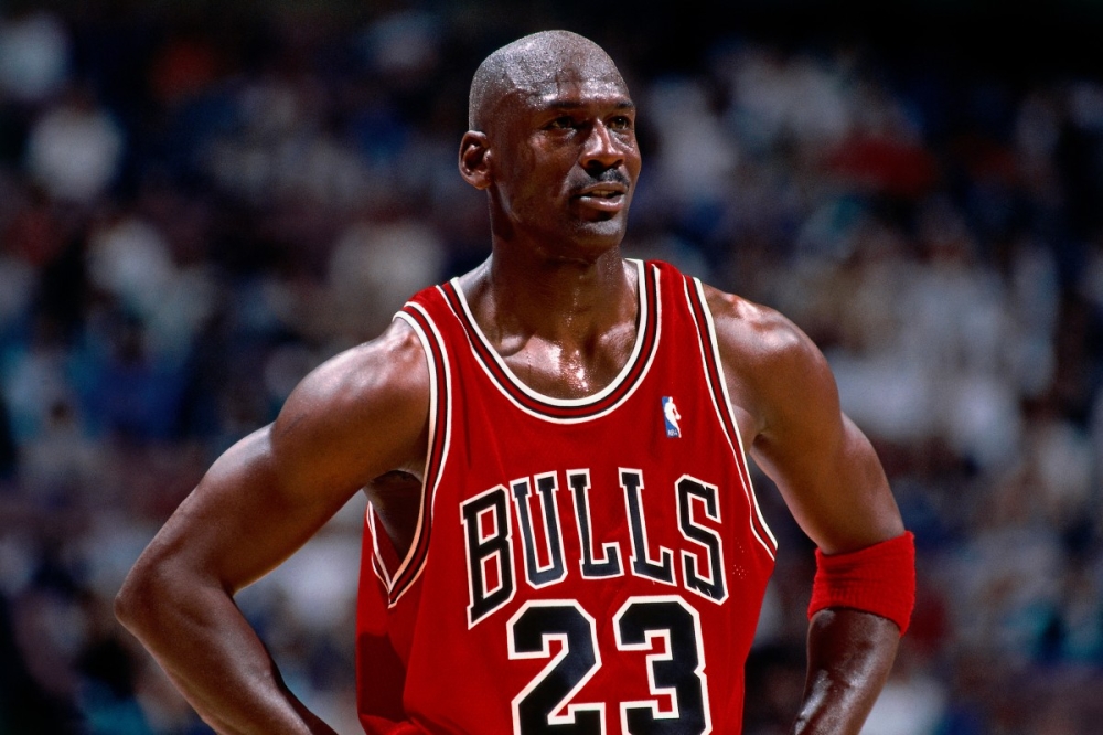 Michael Jordan of the Chicago Bulls looks on during a 1998 NBA playoff game against the New Jersey Nets at Continental Airlines Arena in East Rutherford, New Jersey, on April 29, 1998. A jersey he wore during the 1998 NBA Finals has sold for US$14 million. — Getty Images pic via AFP