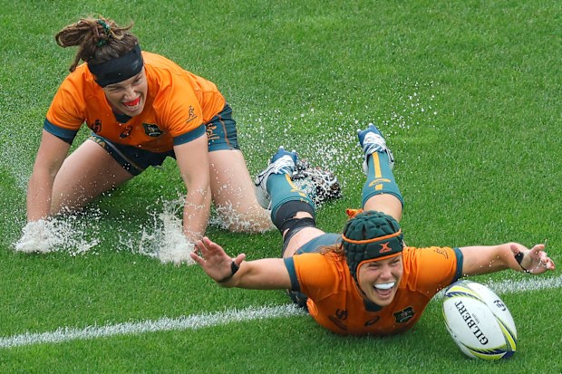 Emily Chancellor (right) celebrates scoring a try during the Rugby World Cup quarter-final match between England and Australia at Waitakere Stadium.