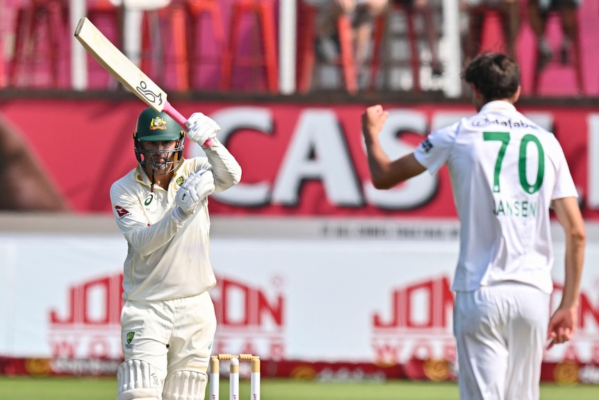 Nathan Lyon signals for a review after being given out LBW against South Africa.