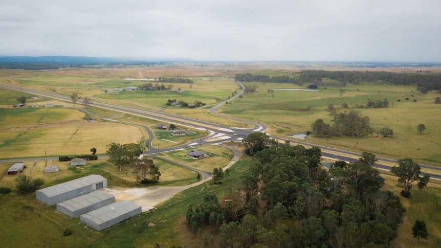 Several houses and sheds, seen from above