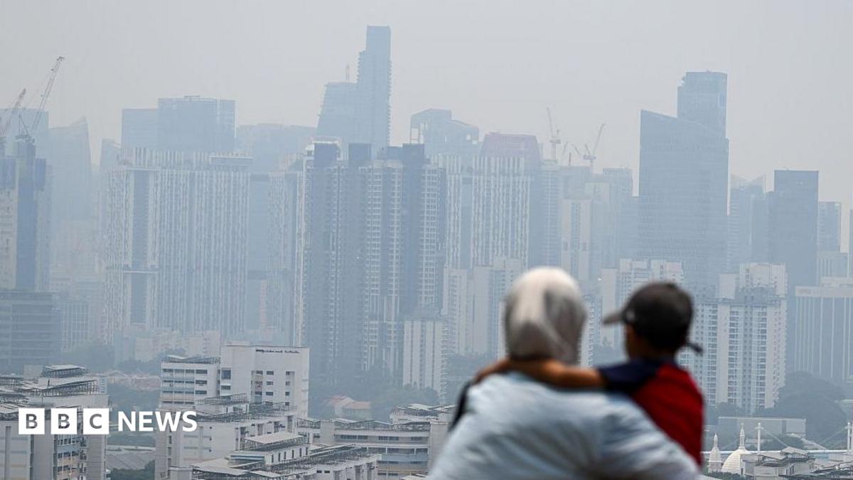 Toxic haze from Indonesia shuts schools in Malaysia as pollution hits record levels in Singapore