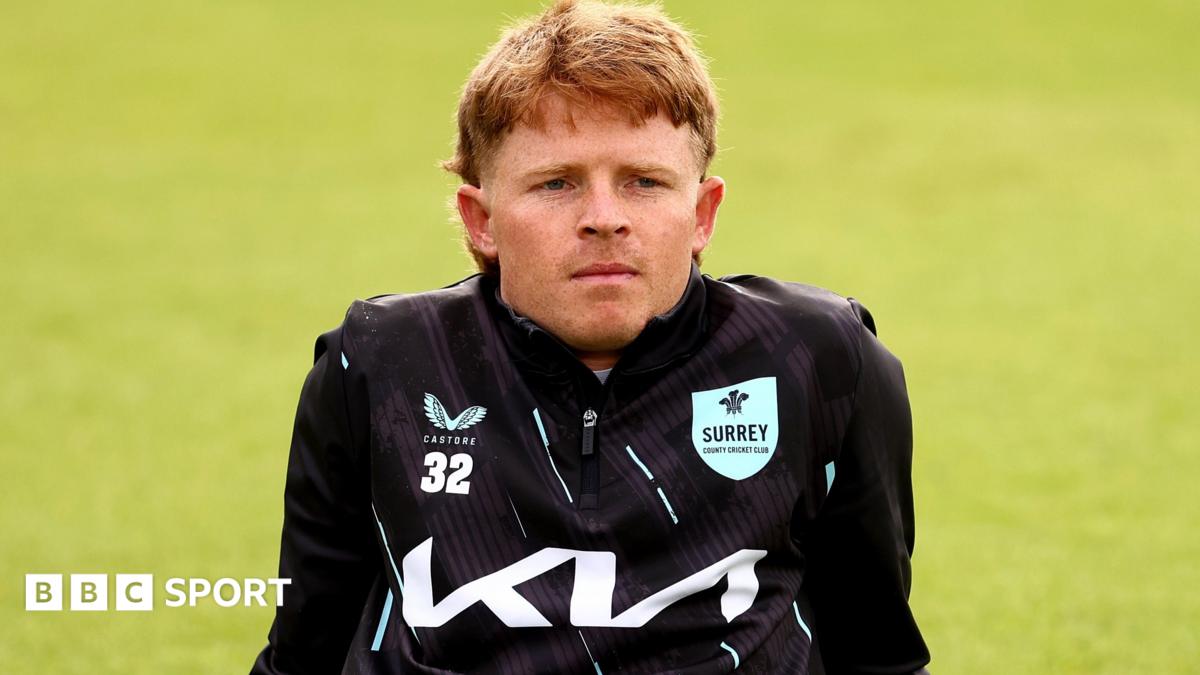 Ollie Pope looks on