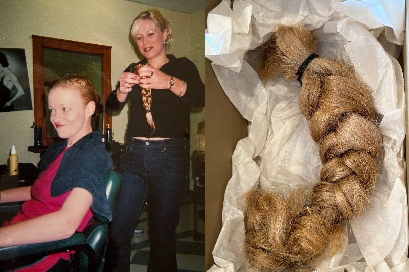 A woman with long blonde hair has her braid cut off. She is smiling.